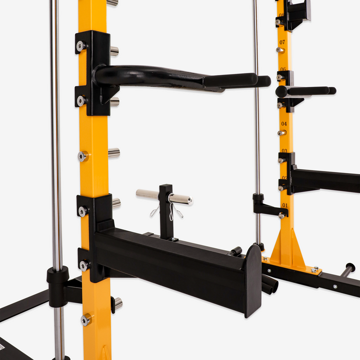 Yellow and black weightlifting rack on a white background