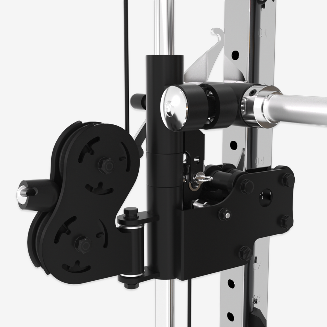 Close-up of a gym weightlifting machine with black pulleys and silver metal.