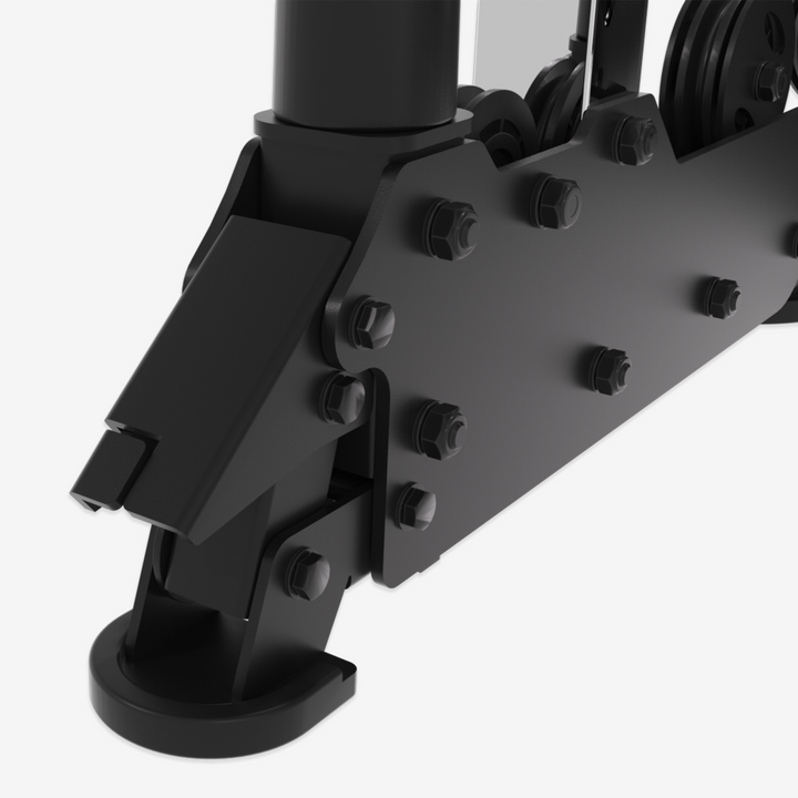 Close-up of a black mechanical component with bolts on a white background