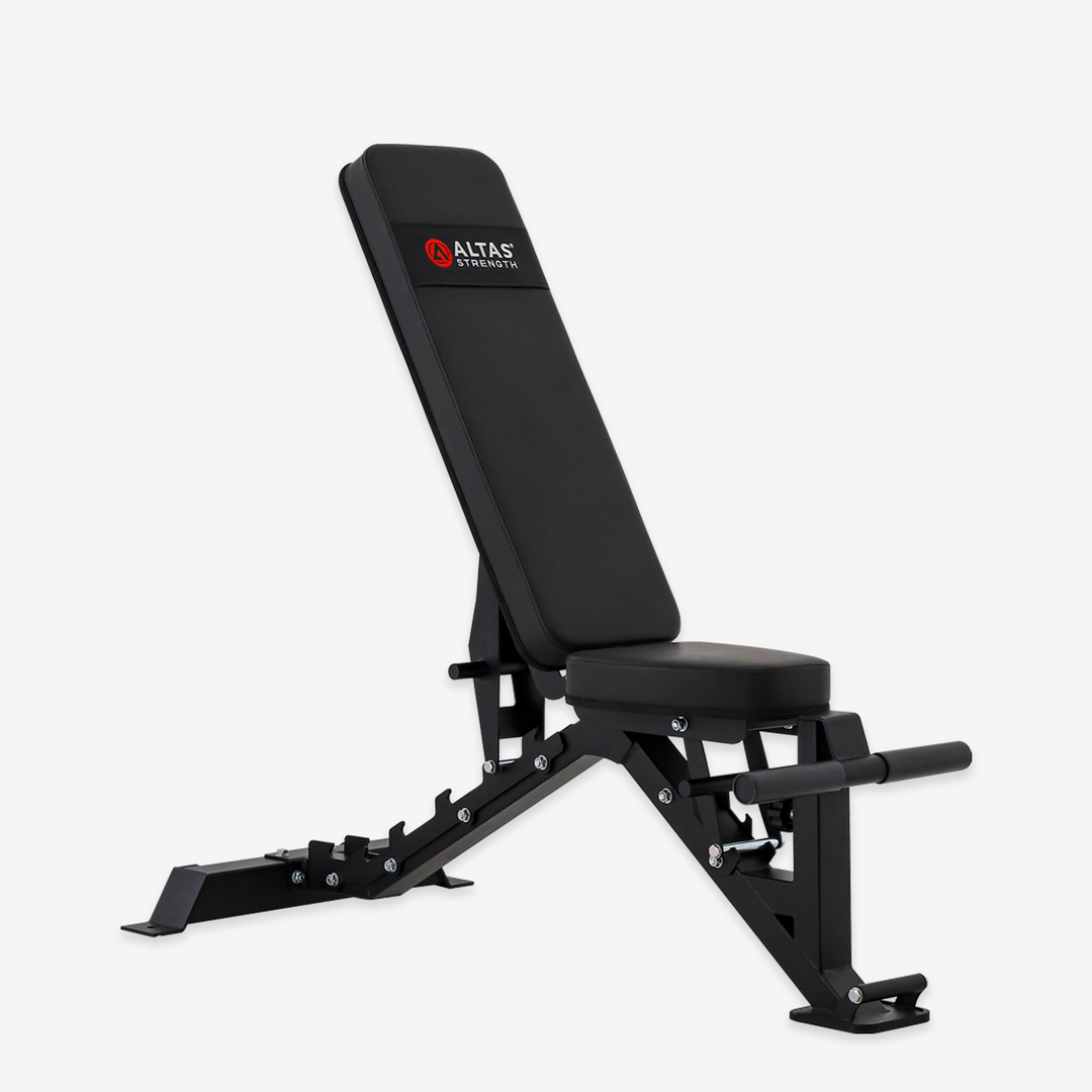 Black weight bench with Atlas Strengths logo on a white background