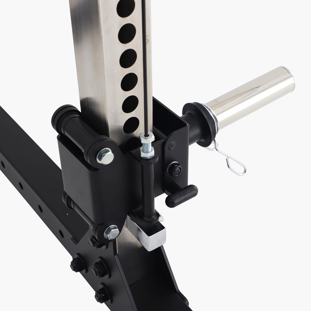 Close-up of a mechanical component with black and silver parts on a white background