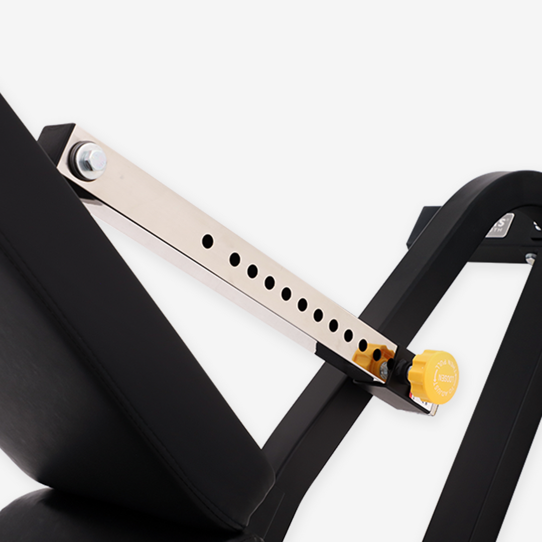 Close-up of a black exercise bike with a white background