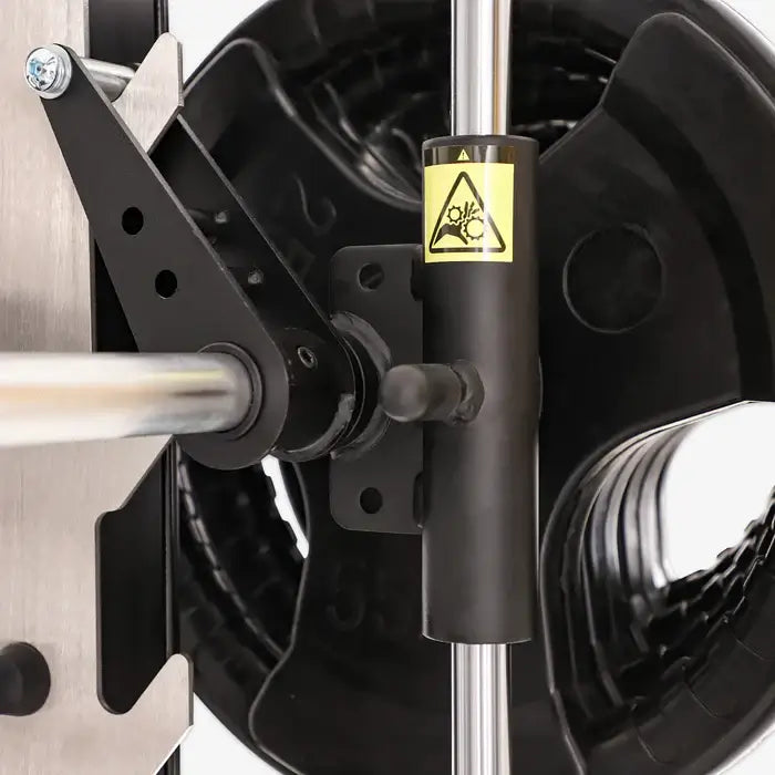 Close-up of the pulley system and safety features on the Altas AL-M810 Smith Machine, designed for strength training.