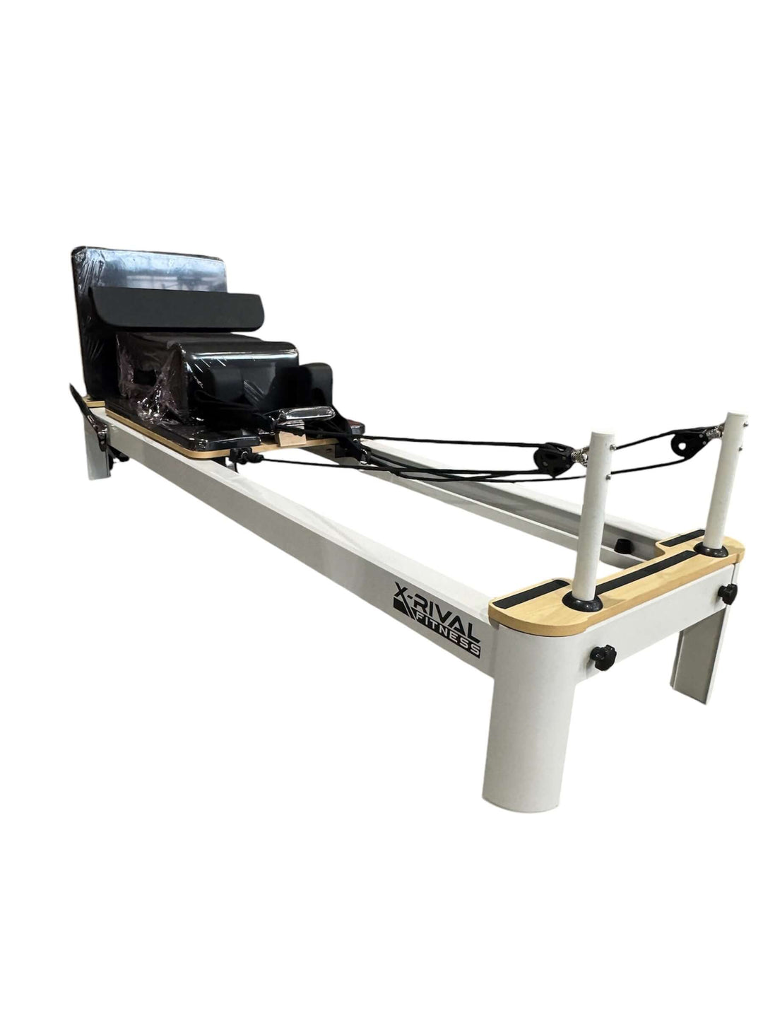 Pilates Reformer S compact machine with smooth-glide rails, ideal for home and studio use in Canada.