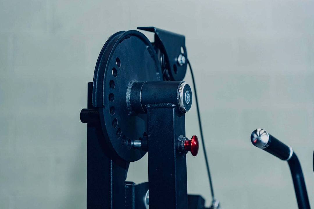 Close-up of the adjustable pulley on the X-RIVAL XB05 Leg Extension Machine for effective leg workouts.