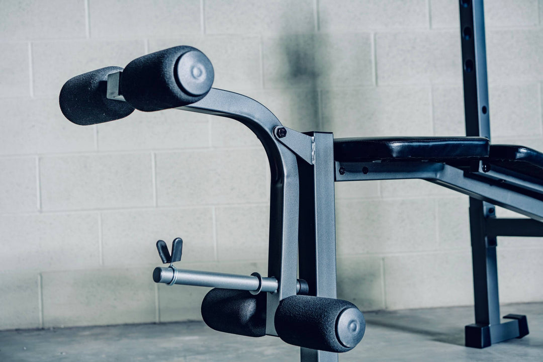 Close-up of the X-RIVAL Press Bench ABP78 leg attachment, highlighting its sturdy construction for upper body workouts.