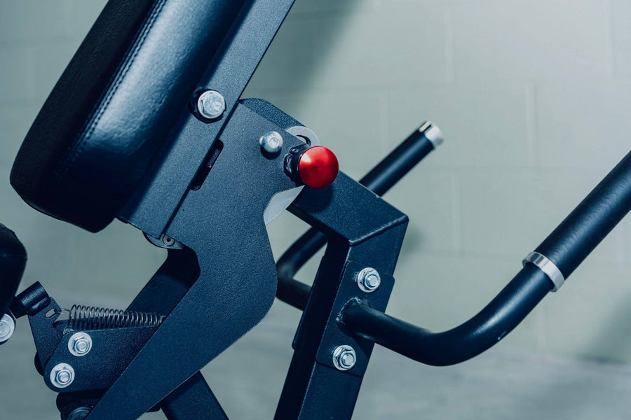 Close-up of the adjustable mechanism on the X-RIVAL XB05 Leg Extension Machine for optimal leg workouts.